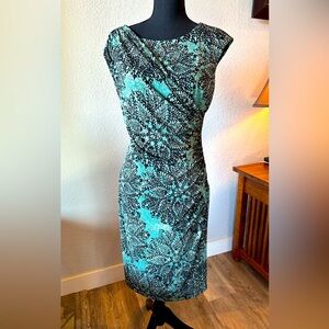 Connected Apparel drapping floral dress.